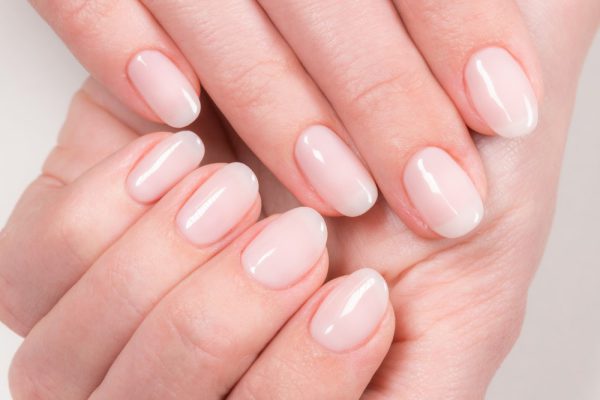 Closeup,Top,View,Of,Elegant,Pastel,Pink,Natural,Manicure.,Female